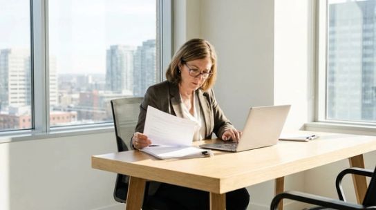 Immigration consultant reviewing Express Entry draw details
