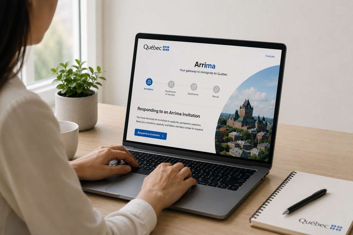 A person sitting at a desk using a laptop displaying the Quebec Arrima immigration portal.