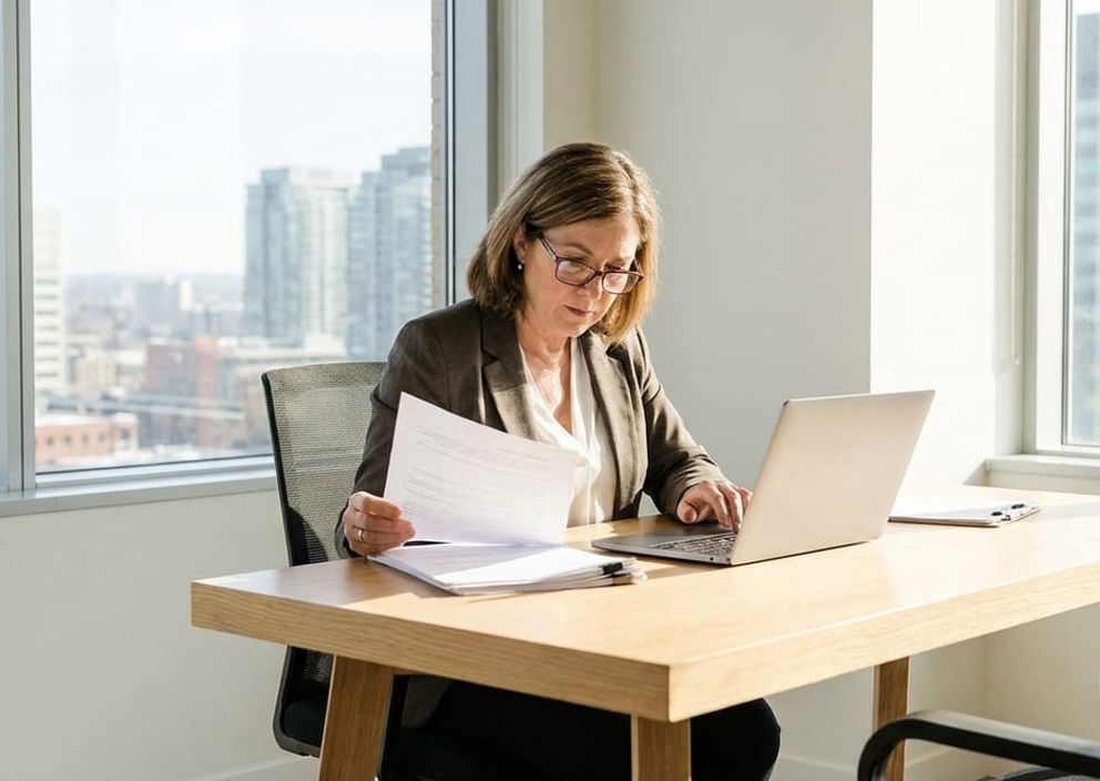 Immigration consultant reviewing Express Entry draw details