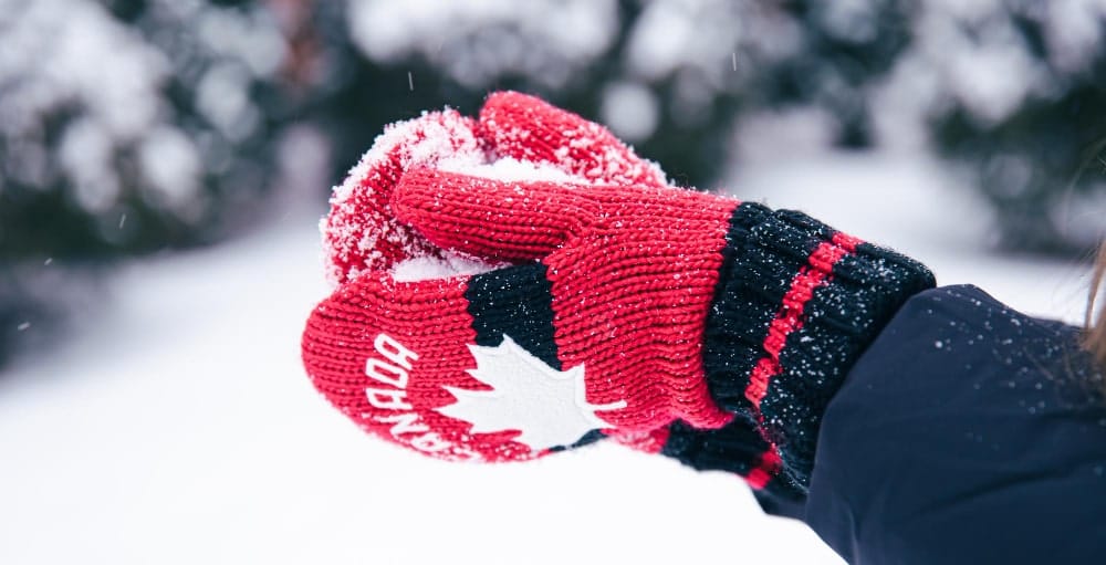 Gloves with Canada in the snow design