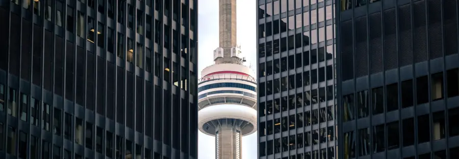 a tower in Ontario between two tall buildings