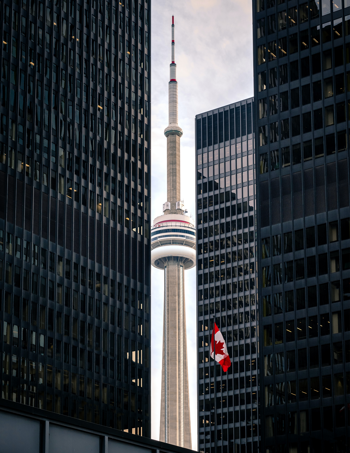 a tower in Ontario between two tall buildings