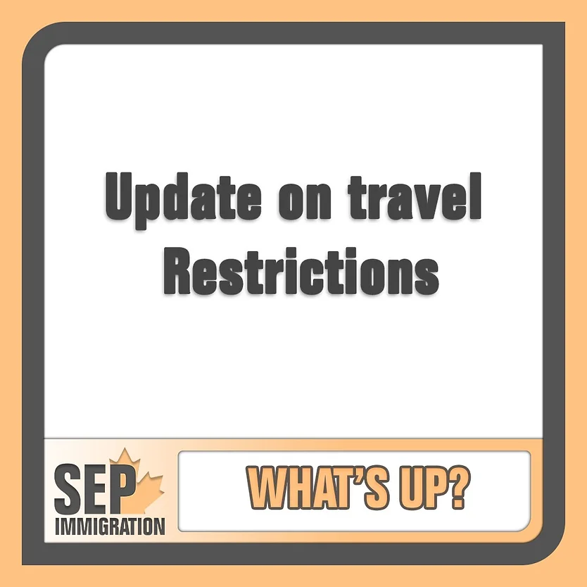 a banner with "update on travel restrictions" written on it