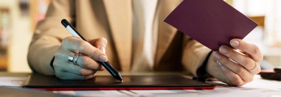 reviewing documents at a metal table