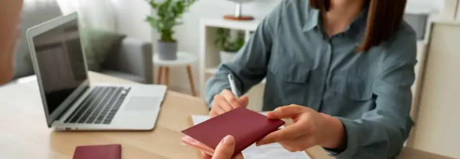 passport handover travel office interview.webp