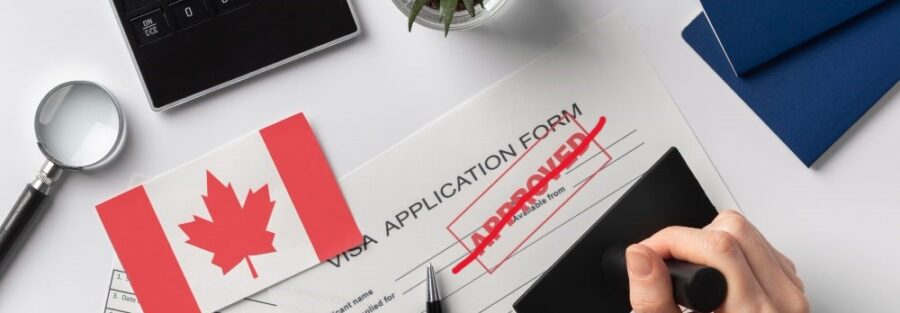 Canada visa application form with 'Approved' crossed out, symbolizing a rejected application.