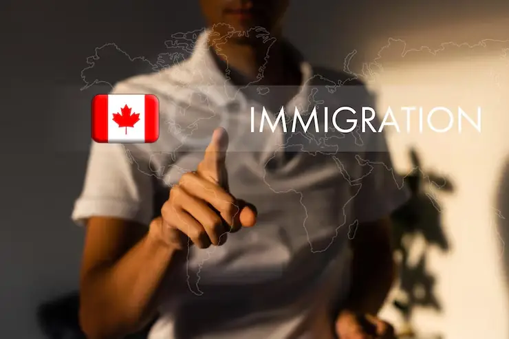 A person interacting with a digital map of Canada, symbolizing the immigration process for foreign nationals with work experience in essential occupations.