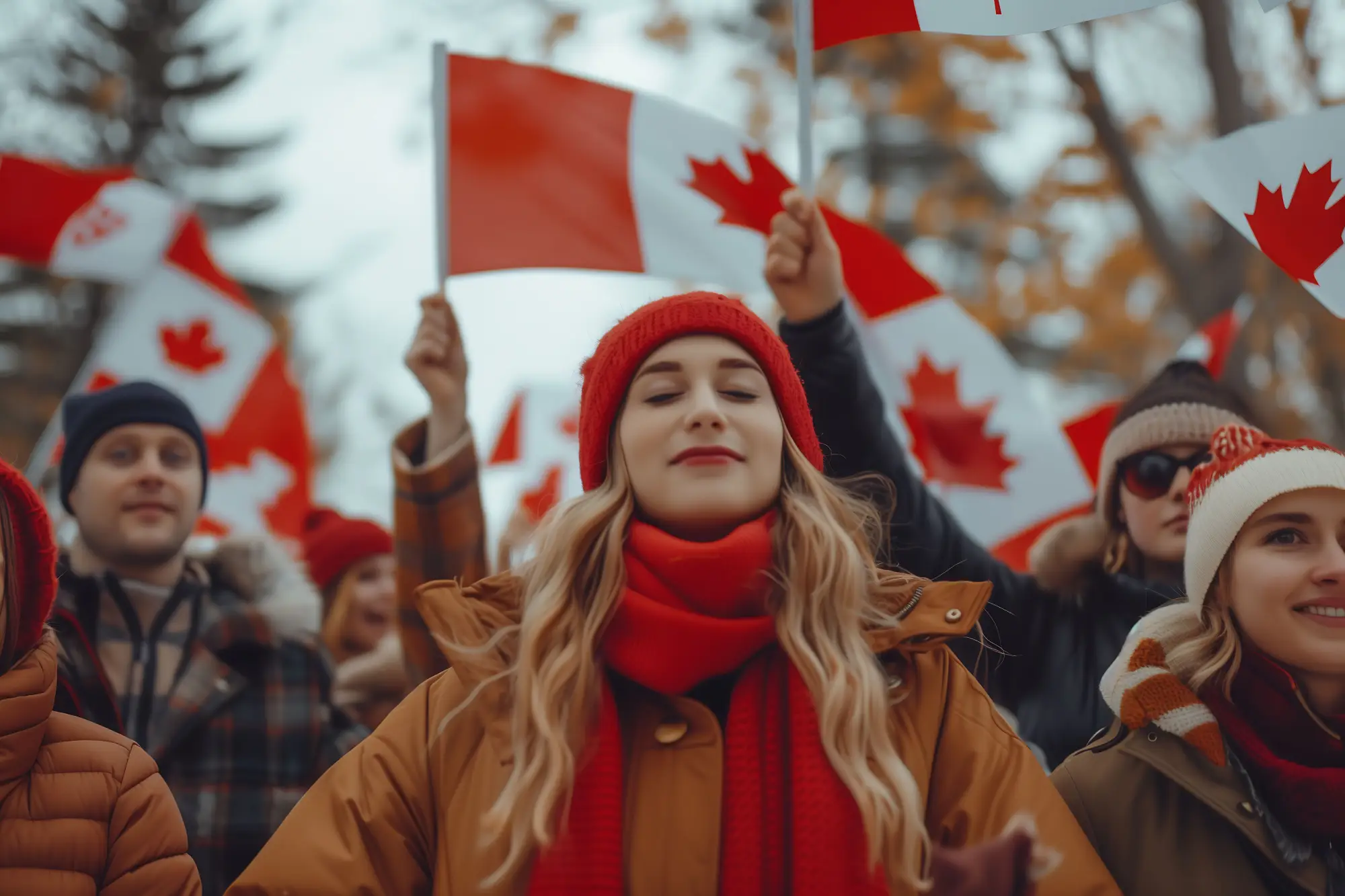 People celebrating with Canadian flags amid news on refugee acceptance target by IRCC
