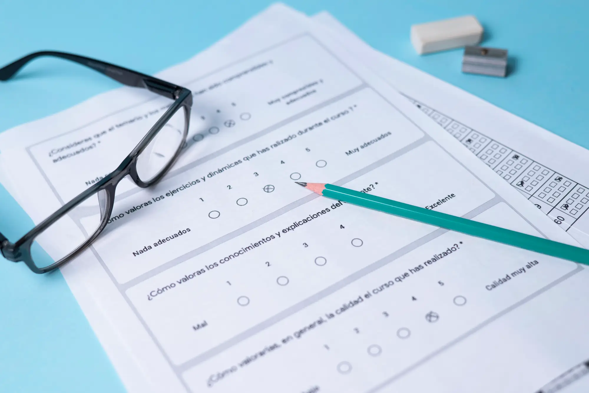 Citizenship test paper with pencil and glasses representing Canadian citizenship exam questions