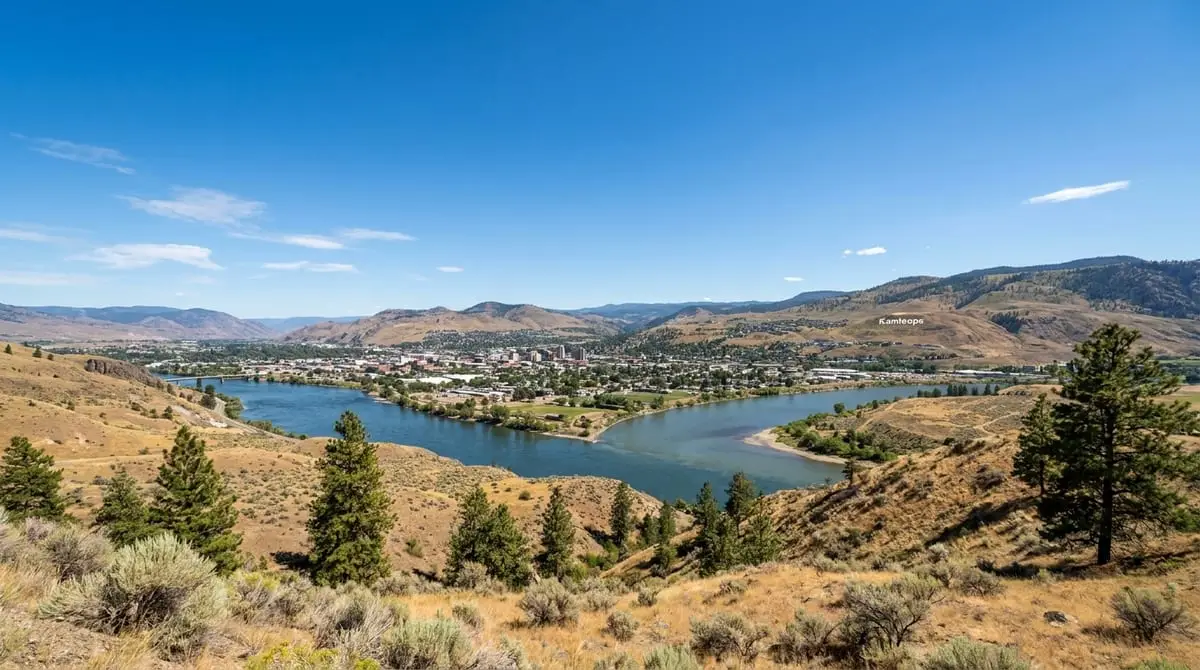 Photograph of the Overlanders Bridge crossing the Thompson River in Kamloops on a bright, sunny afternoon.