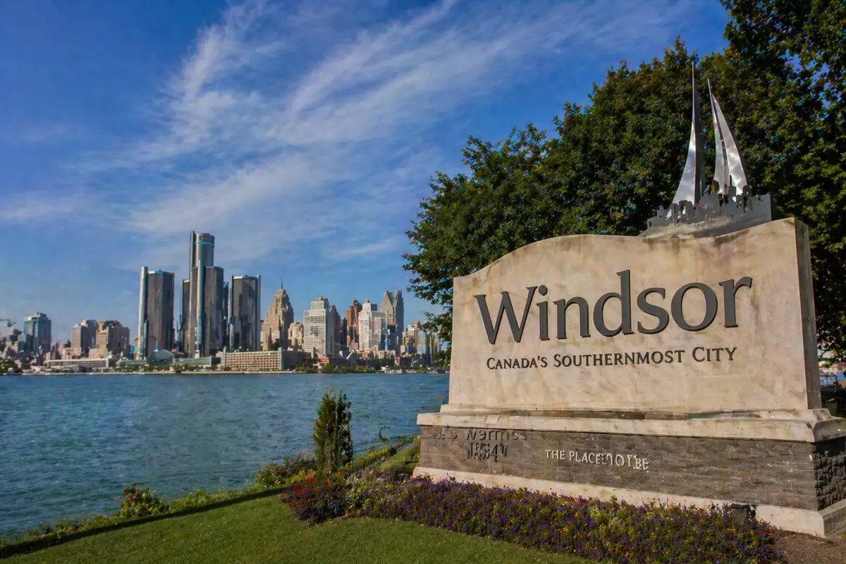 “Riverfront park in Windsor with skyline view across the Detroit River on a clear day”
