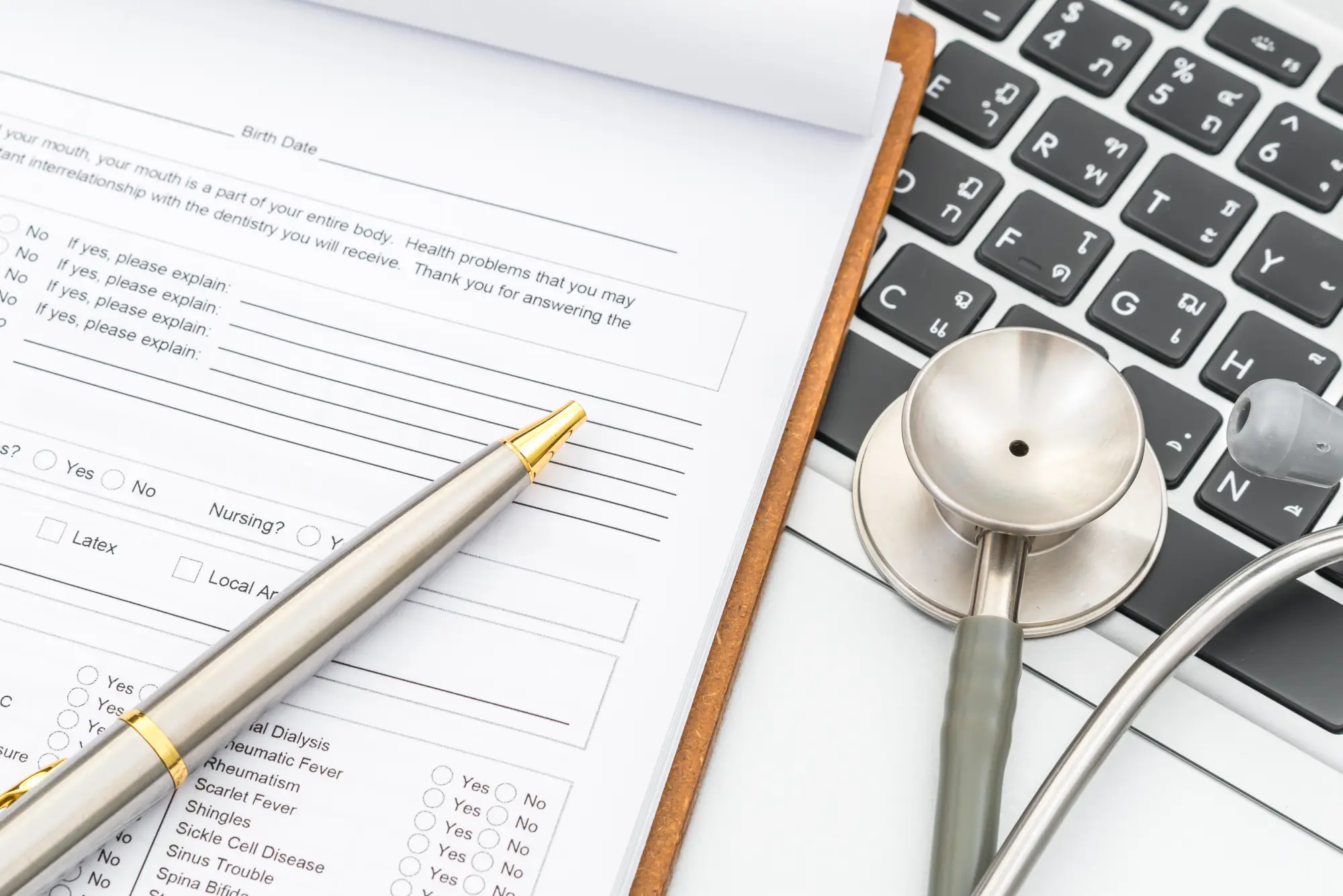 
"A medical form and stethoscope, symbolizing the medical examination process for immigration