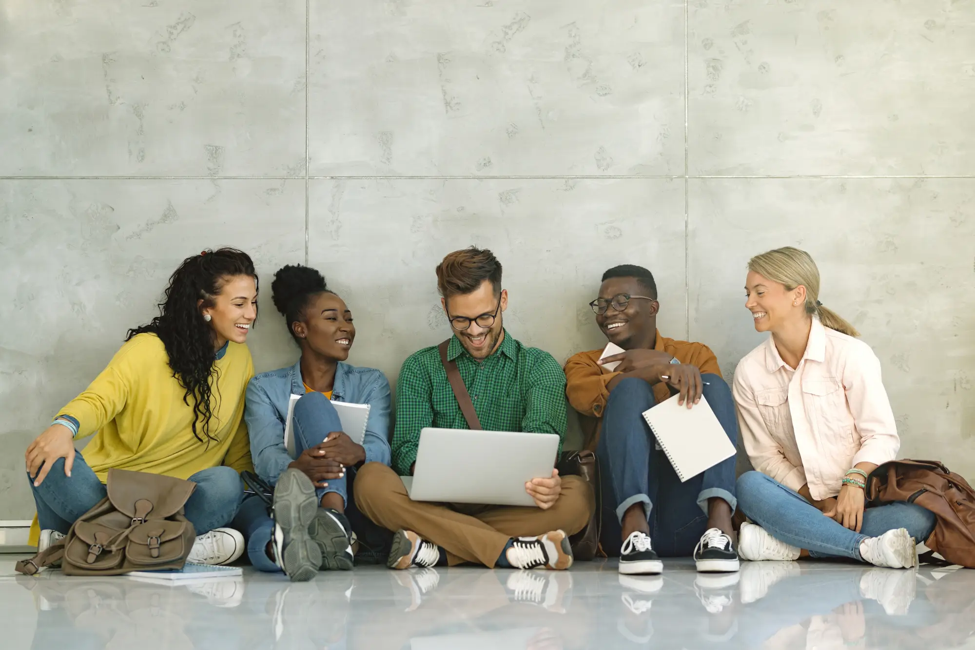 Group of international students studying together in Canada, eligible for PGWP